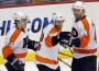 Philadelphia Flyers' Briere and Meszaros celebrate with teammate Leino after his goal against Pittsburgh Penguins in Pittsburgh Philadelphia Flyers' Briere and Meszaros celebrate with teammate Leino after his goal against Pittsburgh Penguins in Pittsburgh
