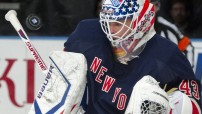 Rangers' Biron stops a Jets shot in the third period of their NHL hockey game at Madison Square Garden in New York