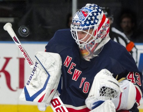 Rangers' Biron stops a Jets shot in the third period of their NHL hockey game at Madison Square Garden in New York